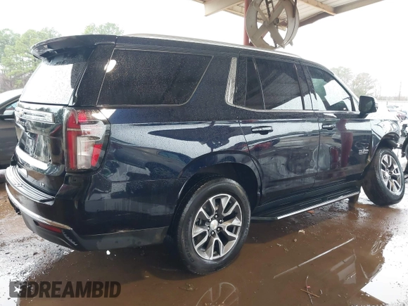2023 Chevrolet Tahoe LT with VIN 1GNSKNKD8PR557980, listed as a IAAI auction lot 41562421 with 29,586 mi miles and . Bid and sale history available at DreamBid. Image 4.