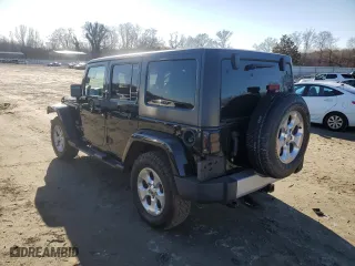 2013 Jeep Wrangler Unlimited Sahara with VIN 1C4HJWEG1DL517739, listed as a Copart auction lot 45569605 with 54,405 mi miles and Salvage Title. Bid and sale history available at carsss.com. Image 2.