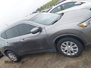 2015 Nissan Rogue SV with VIN KNMAT2MTXFP529743, listed as a IAAI auction lot 41883304 with 135,272 mi miles and . Bid and sale history available at DreamBid. Image 13.