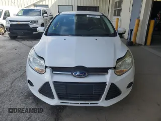 2014 Ford Focus SE z VIN 1FADP3K22EL119306, wystawiony jako Copart lot #56653505 z przebiegiem 109 021 mil mil oraz Czysty tytuł • Clean title. Historia ofert i sprzedaży dostępna na DreamBid. Obrazek 5.