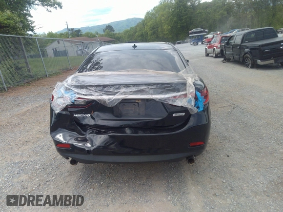 2015 Mazda 6 i Grand Touring with VIN JM1GJ1W68F1168078, listed as a IAAI auction lot 42149519 with 127,641 mi miles and . Bid and sale history available at DreamBid. Image 16.