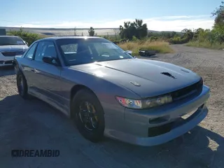 1992 Nissan 240SX z VIN JN1MS34P9NW100593, wystawiony jako IAAI lot #40867667 z przebiegiem Nie podano mil oraz . Historia ofert i sprzedaży dostępna na DreamBid. Obrazek 13.