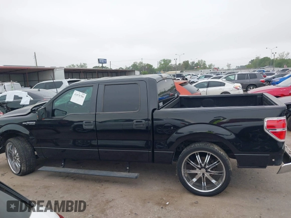 2013 Ford F-150 XL with VIN 1FTFW1CF6DKE60563, listed as a IAAI auction lot 41870786 with 194,464 mi miles and . Bid and sale history available at carsss.com. Image 14.