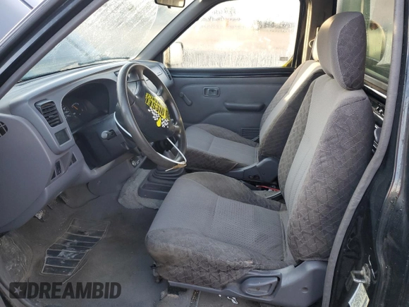 1998 Nissan Frontier XE with VIN 1N6DD21S7WC347623, listed as a Copart auction lot 45347025 with 176,093 mi miles and Salvage title. Bid and sale history available at DreamBid. Image 7.