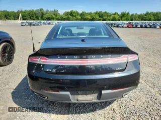 2013 Lincoln MKZ Hybrid z VIN 3LN6L2LU3DR812938, wystawiony jako Copart lot #63583725 z przebiegiem 129 717 mil mil oraz Czysty tytuł • Clean title. Historia ofert i sprzedaży dostępna na DreamBid. Obrazek 6.