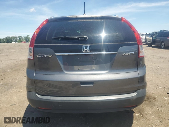 2013 Honda CR-V EX-L z VIN 2HKRM4H7XDH628094, wystawiony jako Copart lot #57358245 z przebiegiem 123 505 mil mil oraz Szkody całkowita. Historia ofert i sprzedaży dostępna na DreamBid. Obrazek 6.