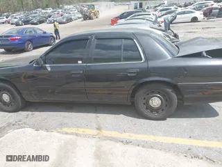 2004 Ford Police Interceptor Base w/3.27 Axle with VIN 2FAFP71W34X136279, listed as a IAAI auction lot 41945086 with 151,350 mi miles. Bid and sale history available at carsss.com. Image 14.