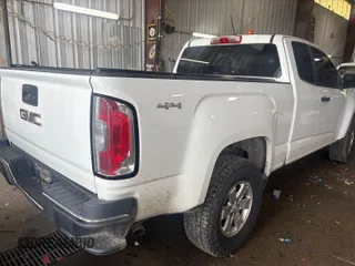 2015 GMC Canyon z VIN 1GTH6AE33F1229463, wystawiony jako IAAI lot #42399992 z przebiegiem 123 157 mil mil oraz . Historia ofert i sprzedaży dostępna na DreamBid. Obrazek 25.