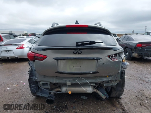 2014 Infiniti QX70 z VIN JN8CS1MU3EM451745, wystawiony jako IAAI lot #42203922 z przebiegiem 144 990 mil mil oraz . Historia ofert i sprzedaży dostępna na DreamBid. Obrazek 16.