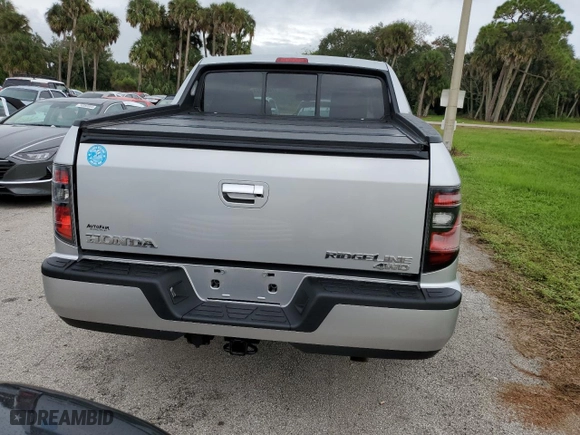 2014 Honda Ridgeline Sport with VIN 5FPYK1F76EB005713, listed as a Copart auction lot 74694724 with 73,039 mi miles and Salvage Title. Bid and sale history available at carsss.com. Image 6.