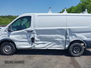 2015 Ford Transit Cargo with VIN 1FTNE1YM1FKB32377, listed as a IAAI auction lot 41976900 with 232,062 mi miles and . Bid and sale history available at DreamBid. Image 15.
