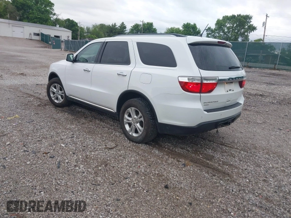2013 Dodge Durango Crew with VIN 1C4RDJDGXDC693933, listed as a IAAI auction lot 42201796 with 169,051 mi miles and . Bid and sale history available at DreamBid. Image 3.