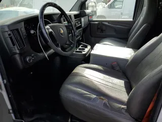 2014 Chevrolet Express Cargo z VIN 1GCWGFCB0E1122350, wystawiony jako Copart lot #58278045 z przebiegiem 99 593 mil mil oraz Czysty tytuł • Clean title. Historia ofert i sprzedaży dostępna na DreamBid. Obrazek 7.
