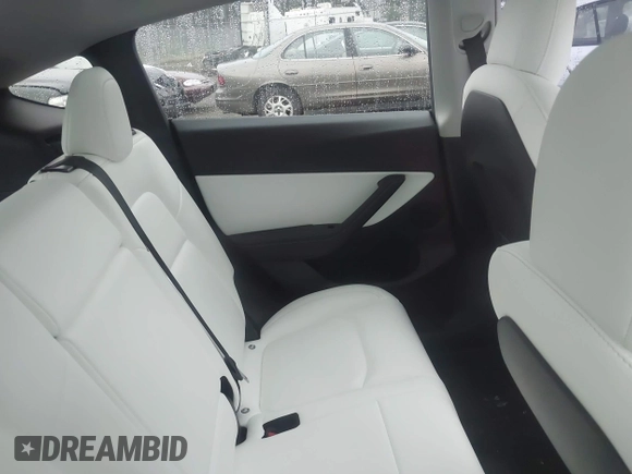 2021 Tesla Model Y Performance z VIN 5YJYGDEF2MF215938, wystawiony jako IAAI lot #41338287 z przebiegiem 63 925 mil mil oraz . Historia ofert i sprzedaży dostępna na DreamBid. Obrazek 8.