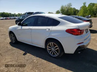 2015 BMW X4 xDrive28i with VIN 5UXXW3C53F0F89089, listed as a Copart auction lot 65869723 with 79,072 mi miles. Bid and sale history available at carsss.com. Image 2.