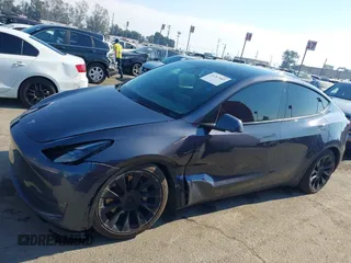 2022 Tesla Model Y Long Range z VIN 7SAYGDEE4NF522698, wystawiony jako IAAI lot #41287885 z przebiegiem 82 306 mil mil oraz . Historia ofert i sprzedaży dostępna na DreamBid. Obrazek 14.