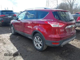 2015 Ford Escape Titanium with VIN 1FMCU9J91FUA97855, listed as a IAAI auction lot 41689650 with 125,487 mi miles. Bid and sale history available at carsss.com. Image 3.
