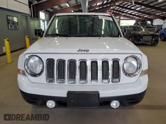 2014 Jeep Patriot Latitude with VIN 1C4NJRFB3ED766143, listed as a Copart auction lot 57879215 with 145,733 mi miles and Clean title. Bid and sale history available at DreamBid. Image 5.
