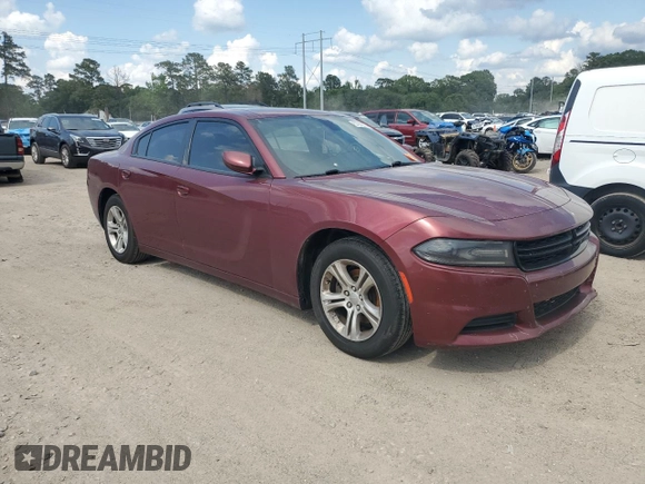 2019 Dodge Charger SXT with VIN 2C3CDXBG4KH721185, listed as a Copart auction lot 57872325 with 123,429 mi miles and Salvage title. Bid and sale history available at DreamBid. Image 4.