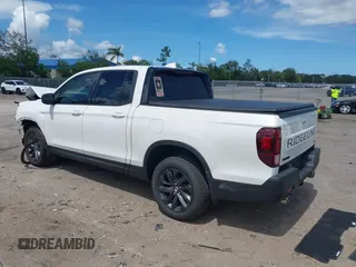 2024 Honda Ridgeline Sport with VIN 5FPYK3F14RB011166, listed as a IAAI auction lot 42591313 with 5,175 mi miles and . Bid and sale history available at DreamBid. Image 3.
