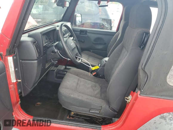 2005 Jeep Wrangler X z VIN 1J4FA39S15P337816, wystawiony jako Copart lot #55957725 z przebiegiem 107 030 mil mil oraz Szkoda całkowita • Salvage title. Historia ofert i sprzedaży dostępna na DreamBid. Obrazek 7.