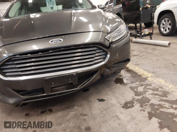 2015 Ford Fusion SE with VIN 1FA6P0H7XF5124074, listed as a IAAI auction lot 41658822 with 127,886 mi miles and . Bid and sale history available at carsss.com. Image 14.