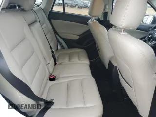 2014 Mazda CX-5 Touring with VIN JM3KE2CY1E0379158, listed as a Copart auction lot 50085935 with 90,340 mi miles and Salvage Title. Bid and sale history available at carsss.com. Image 11.