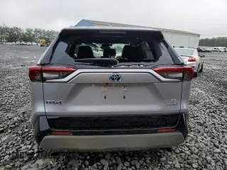 2023 Toyota RAV4 Hybrid SE with VIN JTM16RFV7PD100111, listed as a Copart auction lot 56682135 with 32,198 mi miles and Salvage title. Bid and sale history available at DreamBid. Image 6.