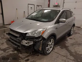 2015 Ford Escape Titanium with VIN 1FMCU9J91FUA97063, listed as a IAAI auction lot 41630110 with NaN miles. Bid and sale history available at carsss.com. Image 18.