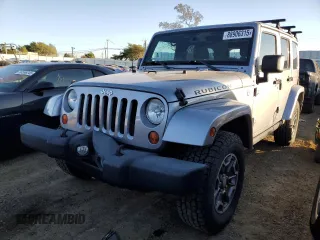 2013 Jeep Wrangler Unlimited Rubicon with VIN 1C4BJWFGXDL556365, listed as a Copart auction lot 88906315 with 113,880 mi miles and Salvage Title. Bid and sale history available at carsss.com. Image 1.