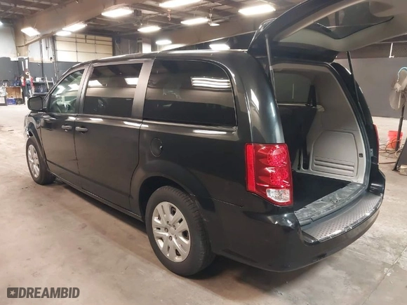2019 Dodge Grand Caravan SE with VIN 2C4RDGBG2KR591780, listed as a IAAI auction lot 41958861 with 72,574 mi miles. Bid and sale history available at carsss.com. Image 3.