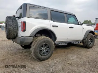 2024 Ford Bronco Wildtrak z VIN 1FMEE2BP4RLA19493, wystawiony jako Copart lot #57669545 z przebiegiem 12 065 mil mil oraz Szkoda całkowita • Salvage title. Historia ofert i sprzedaży dostępna na DreamBid. Obrazek 3.