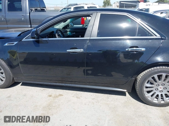 2012 Cadillac CTS Performance z VIN 1G6DJ5E30C0156576, wystawiony jako IAAI lot #42287858 z przebiegiem 106 497 mil mil oraz . Historia ofert i sprzedaży dostępna na DreamBid. Obrazek 15.