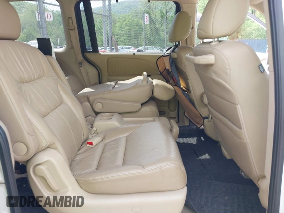 2010 Honda Odyssey Touring с VIN 5FNRL3H90AB039449, выставлен на аукционе IAAI как лот 42032203 с пробегом 128 265 миль миль и . История ставок и продаж доступна на DreamBid. Изображение 8.