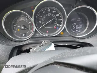 2014 Mazda Mazda6 i Touring with VIN JM1GJ1V68E1128650, listed as a IAAI auction lot 42035713 with 171,609 mi miles. Bid and sale history available at carsss.com. Image 11.
