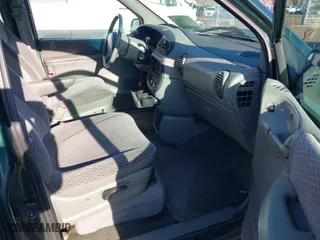 1999 Dodge Caravan SE with VIN 2B4GP44G9XR135970, listed as a IAAI auction lot 41714951 with 173,451 mi miles. Bid and sale history available at carsss.com. Image 5.