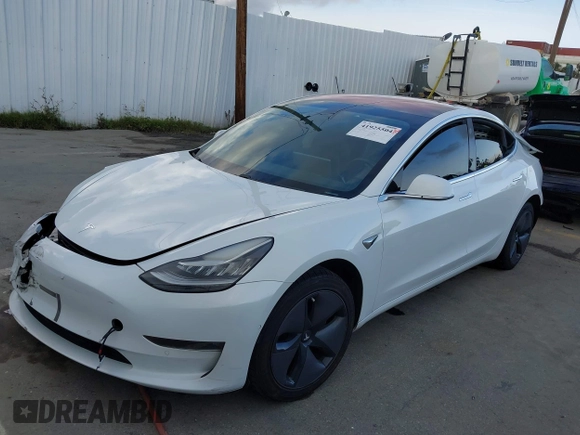 2018 Tesla Model 3 Long Range Battery with VIN 5YJ3E1EA3JF023300, listed as a IAAI auction lot 41925504 with 100,512 mi miles and . Bid and sale history available at DreamBid. Image 2.