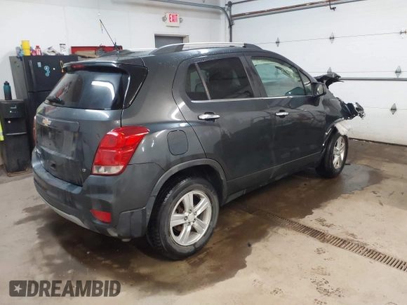 2017 Chevrolet Trax LT with VIN 3GNCJPSBXHL163410, listed as a IAAI auction lot 41585473 with 64,969 mi miles. Bid and sale history available at carsss.com. Image 4.
