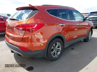 2014 Hyundai Santa Fe z VIN 5XYZUDLB4EG138898, wystawiony jako IAAI lot #42196491 z przebiegiem Nie podano mil oraz . Historia ofert i sprzedaży dostępna na DreamBid. Obrazek 4.