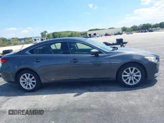 2016 Mazda Mazda6 i Sport with VIN JM1GJ1U5XG1482164, listed as a IAAI auction lot 42052618 with 79,630 mi miles. Bid and sale history available at carsss.com. Image 13.