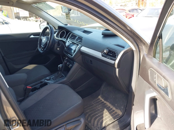 2019 Volkswagen Tiguan S with VIN 3VV0B7AX0KM119702, listed as a IAAI auction lot 42069676 with 69,637 mi miles and . Bid and sale history available at DreamBid. Image 5.