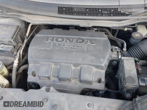 2012 Honda Odyssey EX-L with VIN 5FNRL5H63CB063815, listed as a IAAI auction lot 42302937 with 377,768 mi miles and . Bid and sale history available at DreamBid. Image 10.