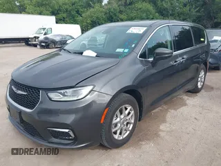 2023 Chrysler Pacifica Touring L with VIN 2C4RC1BG8PR594481, listed as a IAAI auction lot 42618839 with 60,748 mi miles and . Bid and sale history available at DreamBid. Image 17.