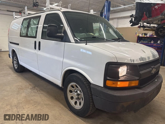 2012 Chevrolet Express Cargo z VIN 1GCSGAFX1C1148431, wystawiony jako IAAI lot #42613587 z przebiegiem 207 299 mil mil oraz . Historia ofert i sprzedaży dostępna na DreamBid. Obrazek 19.