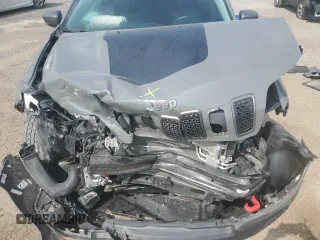 2019 Jeep Cherokee Trailhawk with VIN 1C4PJMBX6KD425554, listed as a Copart auction lot 61097135 with 97,452 mi miles and Salvage title. Bid and sale history available at DreamBid. Image 12.