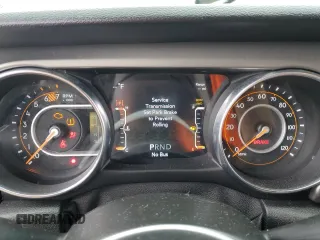 2021 Jeep Wrangler Sport z VIN 1C4GJXAN5MW668474, wystawiony jako Copart lot #53238095 z przebiegiem Nie podano mil oraz Szkody całkowita. Historia ofert i sprzedaży dostępna na DreamBid. Obrazek 9.
