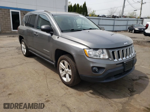 2012 Jeep Compass Latitude with VIN 1C4NJDEB0CD621109, listed as a Copart auction lot 54737735 with 73,323 mi miles and Salvage Title. Bid and sale history available at DreamBid. Image 4.