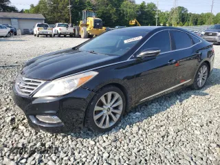 2013 Hyundai Azera z VIN KMHFH4JG2DA266282, wystawiony jako Copart lot #59156175 z przebiegiem 135 013 mil mil oraz Szkoda całkowita • Salvage title. Historia ofert i sprzedaży dostępna na DreamBid. Obrazek 1.