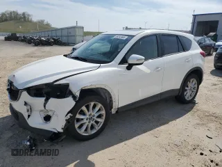2015 Mazda CX-5 Grand Touring with VIN JM3KE4DY3F0496994, listed as a Copart auction lot 56093965 with 184,256 mi miles and Non Repairable. Bid and sale history available at DreamBid. Image 1.