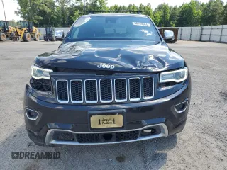 2016 Jeep Grand Cherokee Overland with VIN 1C4RJFCM9GC302353, listed as a Copart auction lot 58789604 with 87,826 mi miles and Clean title. Bid and sale history available at DreamBid. Image 5.